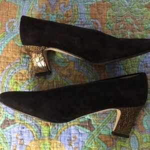 Black suede heels with gold stacked heel